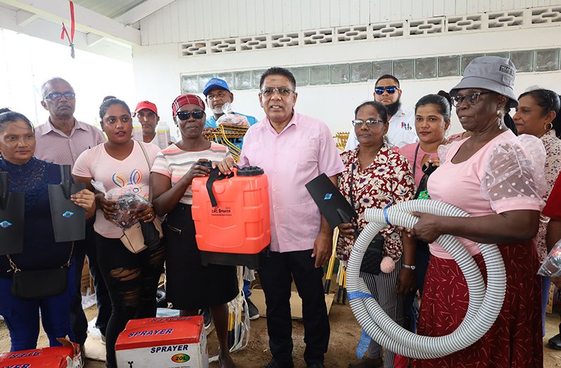 Agriculture Minister Zulfikar Mustapha and representatives from the various farmers' groups who benefitted from farming tools and other inputs