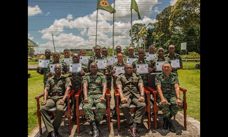 (Seated) Senior GDF officers with the graduates of the Grade Three Agriculture Assistant Course (GDF photo)