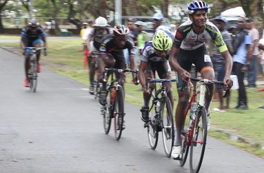 Ajay Gopilall about to cross the final line, the other riders in the photo still had another lap to go.