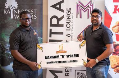 Akeem Greene (left), representing FL Sport and Dinesh Bisessar, representing Montra Restaurant and Lounge