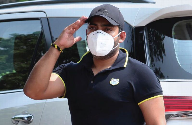 Umar Akmal arrives for the hearing on his ban. (Associated Press)