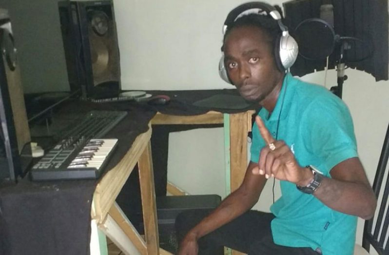 Clifford “Alabama” Charles in his recording studio in Lodge Housing Scheme.