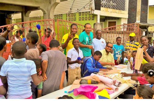 AFC General-Secretary Marlon Williams (sitting) with Councillors Carlyle Goring, Malcolm Ferreira, Heston Bostwick and the kids.