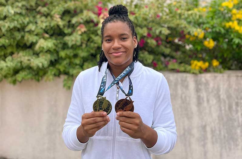 Olympian Aleka Persaud with her medals from the Barbados invitational meet