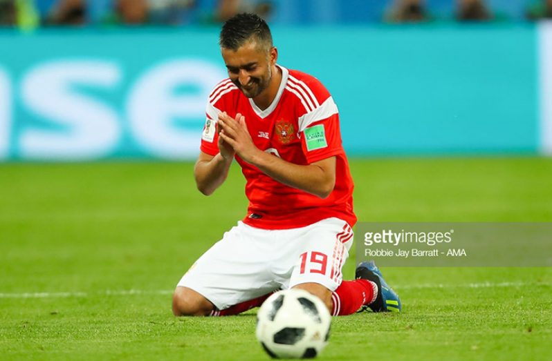 Alexander Samedov of Russia celebrates at the end of the 2018 FIFA World Cup Russia group A match between Russia and Egypt at Saint Petersburg Stadium on June 19, 2018 in Saint Petersburg, Russia. (Photo by Robbie Jay Barratt - AMA/Getty Images)