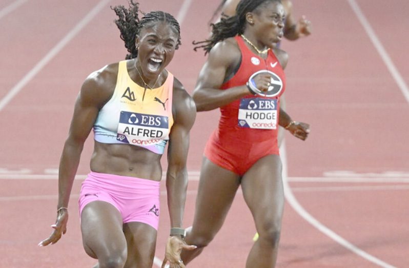 Julien Alfred (left) celebrates after winning the women’s 200 metres at the Monaco Diamond League on Friday