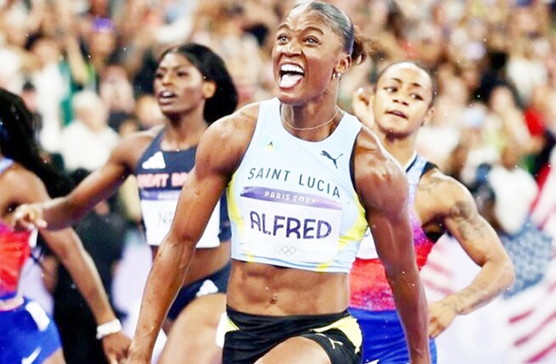 St Lucia's Julien Alfred reacts after winning the women's 100m final at the Paris Olympics on Saturday.