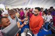 President, Dr. Irfaan Ali speaking with reporters on Saturday (Office of the President photo)