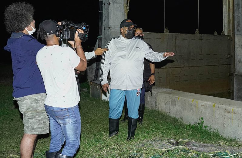 President, Dr Irfaan Ali inspecting the operations of the Northern Relief Channel at Hope/Dochfour, East Coast Demerara, on Sunday night