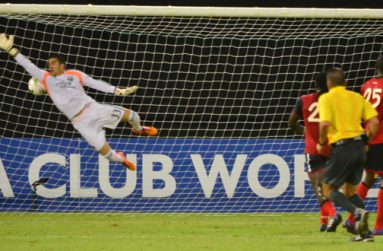 Chronicle photographer Adrian Narine caught Alpha United’s Barbosa Murilo goal that sent Portland Timbers keeper Andrew Weber flying but to no avail.