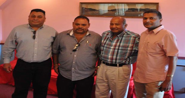 Alvin Kallicharran (2nd from right) in the presence of GCB President Drubahadur, Marketing Manager Raj Singh, and Secretary Anand Sanasie.
