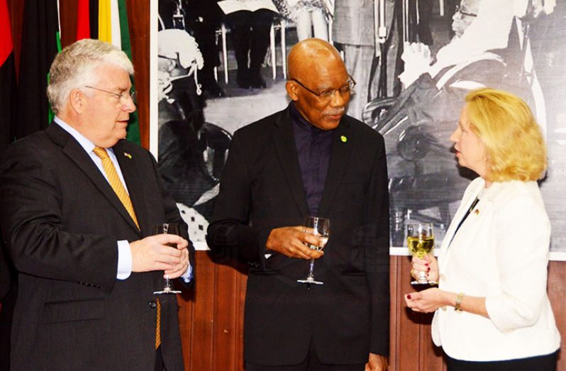 President David Granger (centre) chats with newly-accredited US Ambassador to Guyana US Ambassador Sarah-Ann Lynch and Spouse of the Ambassador Dr. Kevin Healy. (Adrian Narine photo)