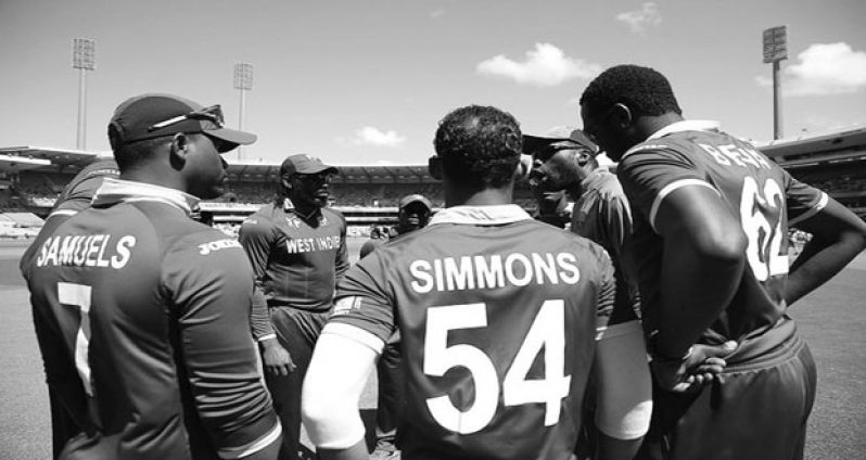 Coach Curtly Ambrose speaks to West Indies players before the 2015 ICC Cricket World Cup match between the regional side and South Africa at the Sydney Cricket ground last Friday (Photo by Mark Metcalfe-IDI/IDI via Getty Images)