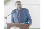 President Dr. Irfaan Ali delivering a heartfelt tribute at Amna Ally’s funeral at CIOG, Woolford Avenue, on Tuesday (Japheth Savory photos)