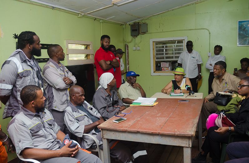 Minister of Social Protection, Amna Ally, (centre) speaks with some of the executives of the Guyana Bauxite and General Workers Union (GBGWU) during her visit to Maple Town, Aroiama on Friday (Delano Williams photo)