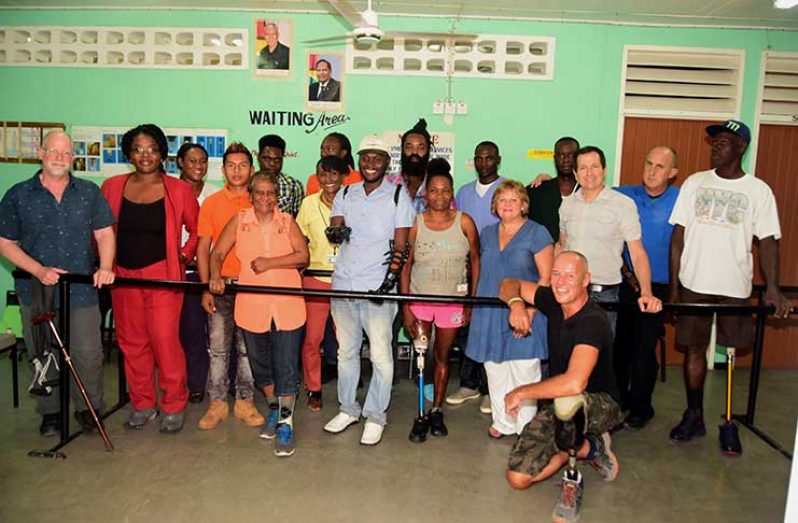 The visiting team and Ptolemy Reid Rehabilitation Centre staff and patients