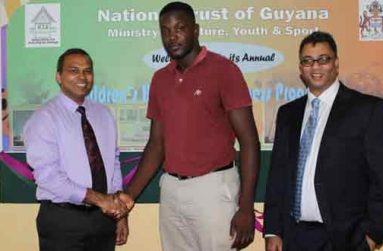 Minister of Sport Dr. Frank Anthony, E-Network/GBL reality show winner Lindani Anderson and GBL President Robin Singh.