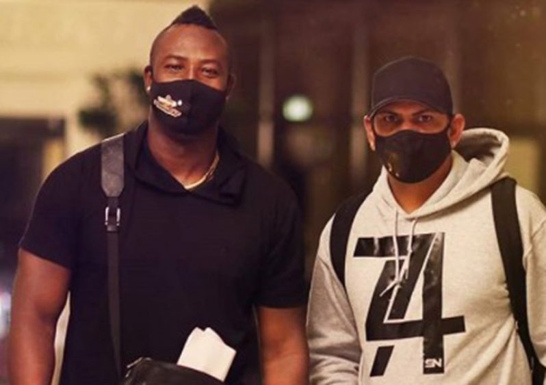 West Indies stars Andre Russell (left) and Sunil Narine arrive in Abu Dhabi