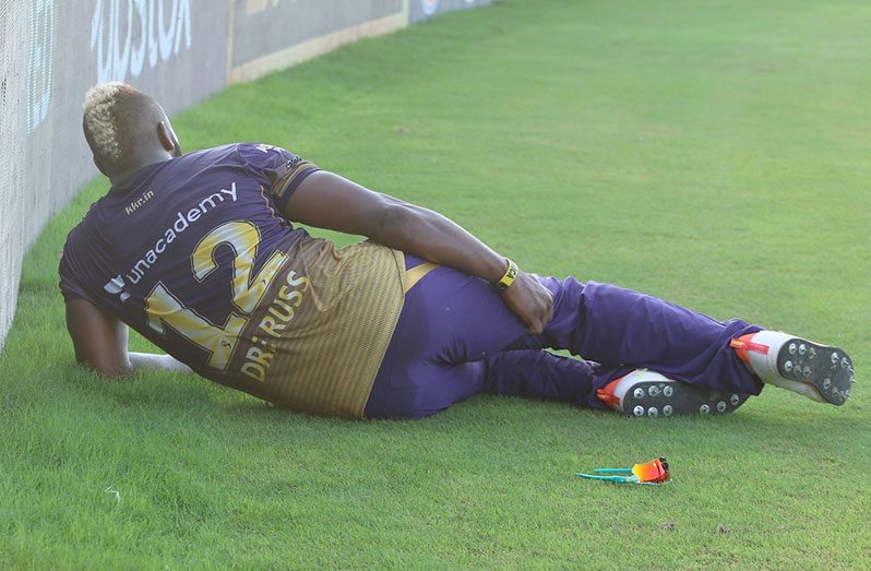 Andre Russell hurt himself while fielding, vs Chennai Super Kings, Abu Dhabi, IPL 2021, September 26, 2021.