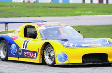 Andrew King sits in his Mazda RX7 at the South Dakota Circuit
