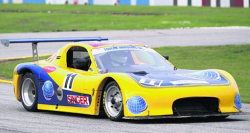 Andrew King sits in his Mazda RX7 at the South Dakota Circuit