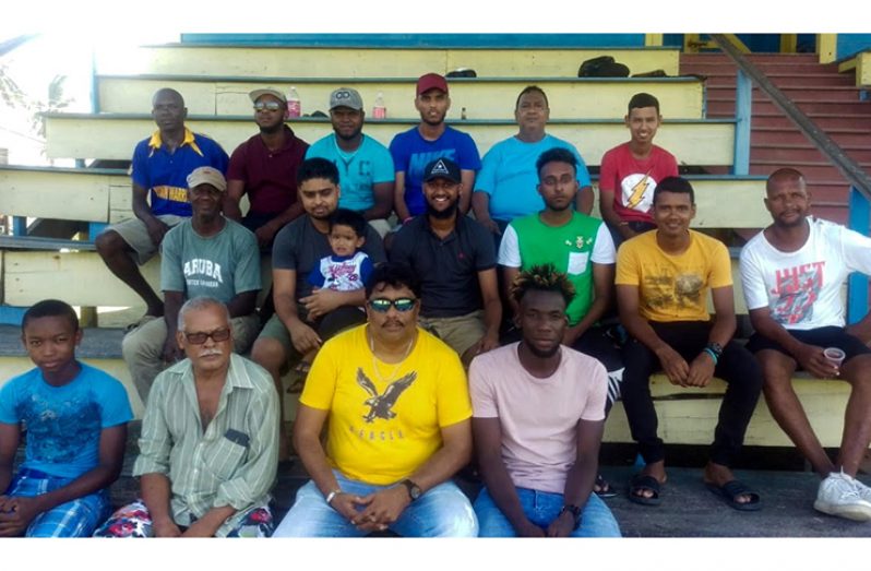 Anil Beharry (front row–third from left) surrounded by players and members of the committee.