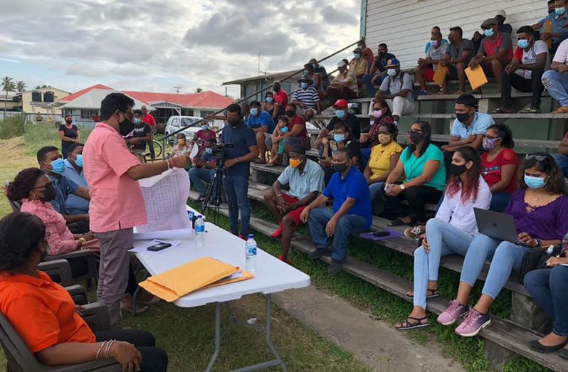 Attorney-General and Minister of Legal Affairs, Anil Nandlall S.C., and a section of the residents gathered at the Enterprise Community CentrE Ground, East Coast Demerara