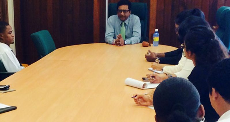 Minister Anil Nandlall meeting with law students on Tuesday at the Ministry of Legal Affairs boardroom