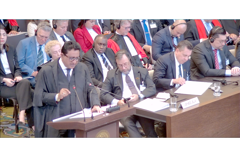 Attorney General Anil Nandlall, SC, presenting Guyana’s closing submissions before the International Court of Justice at the Peace Palace in The Hague, Netherlands, as members of Venezuela’s legal team listen during hearings in the Essequibo border controversy