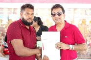 Excitement and gratitude filled the atmosphere in Walton Hall, Region Two, as 78 families finally received their official land transports