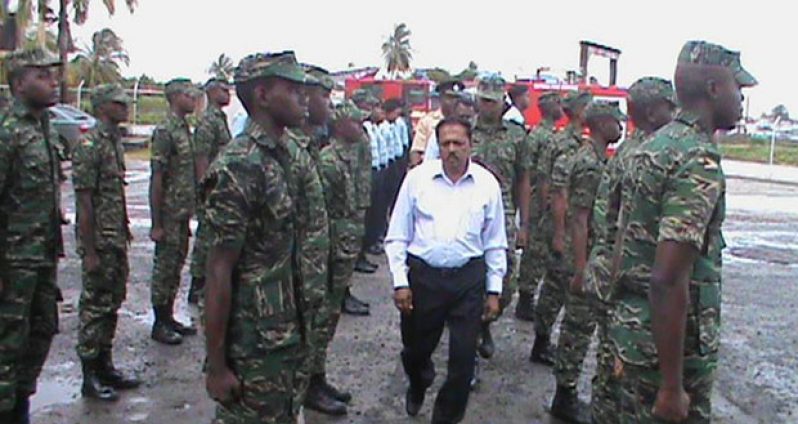 Minister Baksh inspecting the guard of honour at the Anna Regina flag-raising ceremony on Monday morning