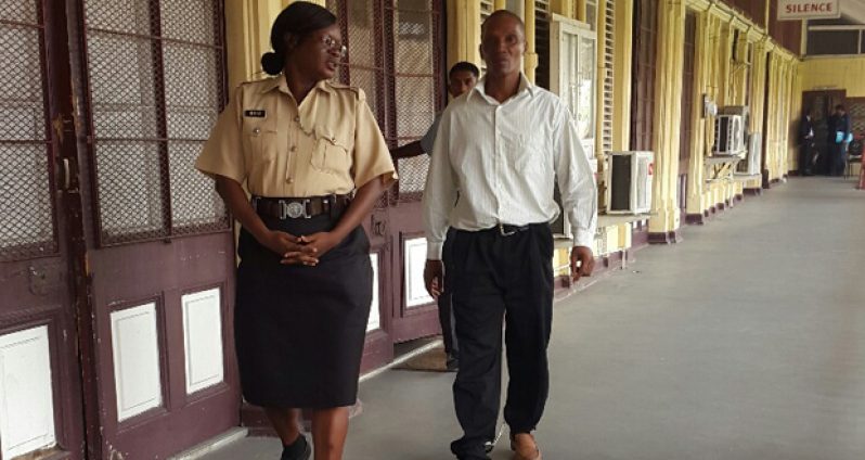 Anthony Morrison being led away from the High Court to prison