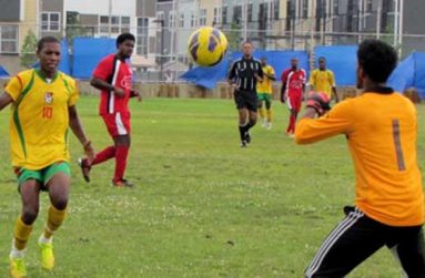 Guyana’s goal-hungry striker Anthony ‘Awo’ Abrams hunts a loose ball against Trinidad over the weekend.