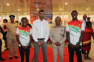 From left: Aaliyah Moore, Shahab Hack, Commissioner of Police, Clifton Hicken and Emanuel Archibald