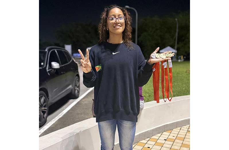 Areil Rodrigues with her medals
