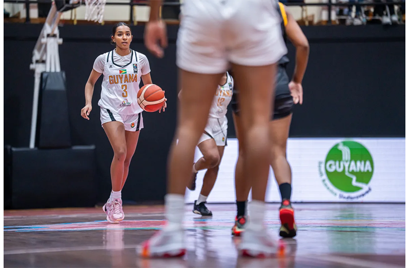 Arshia Ramlall taking the ball up the court for Guyana
