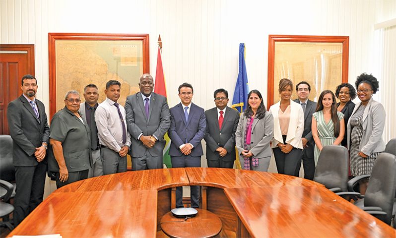Prime Minister, Brigadier (ret’d) Mark Phillips; Senior Minister in the Office of the President with responsibility for Finance, Dr. Ashni Singh and Minister within the Ministry of Public Works, Deodat Indar with representatives of the IDB following the signing of a US$83.3 million agreement to advance transformative solar power projects under the Guyana Utility Scale Solar Photovoltaic Programme (GUYSOL)