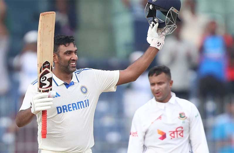 Ravichandran Ashwin celebrates after scoring his sixth Test century.