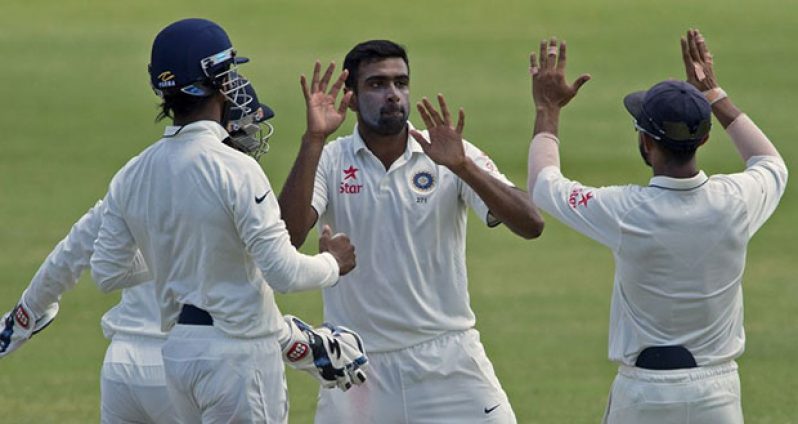 Ravichandran  Ashwin scored his third Test hundred before taking his 17th five-wicket haul to help India to an innings and  92-run victory in Antigua. © AFP