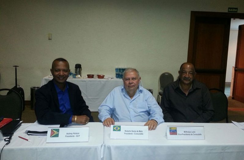 AAG president Aubrey Hutson at the (CONSUDATLE) congress, sitting next to him (from left) are CONSUDATLE president Roberto Gesta de Melo and vice-president Wilfredys Leon.