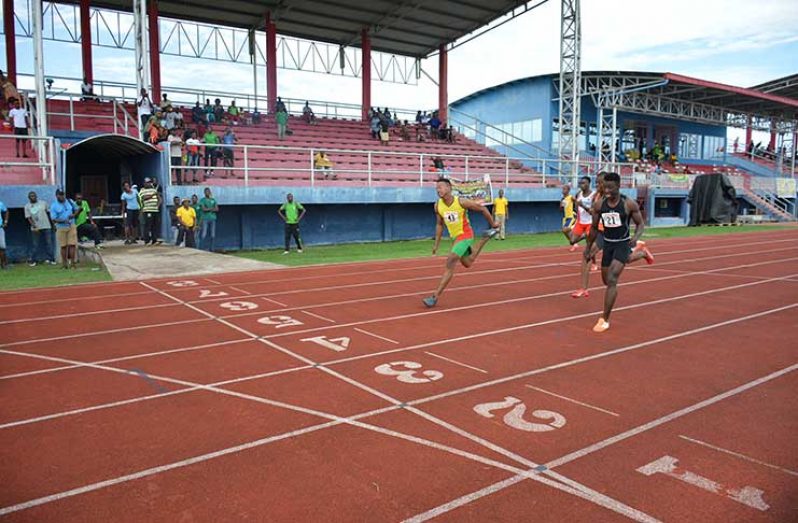 Linden’s Compton Caesar fights his way to a win in the men’s 100m