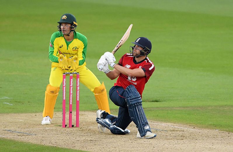 Dawid Malan slog-sweeps for another boundary, England v Australia, 1st T20I, Ageas Bowl, yesterday.