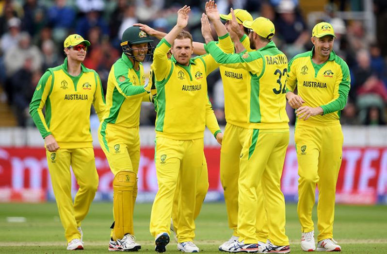 The Aussies, led by Aaron Finch, celebrate their victory against Pakistan. (Getty Images)