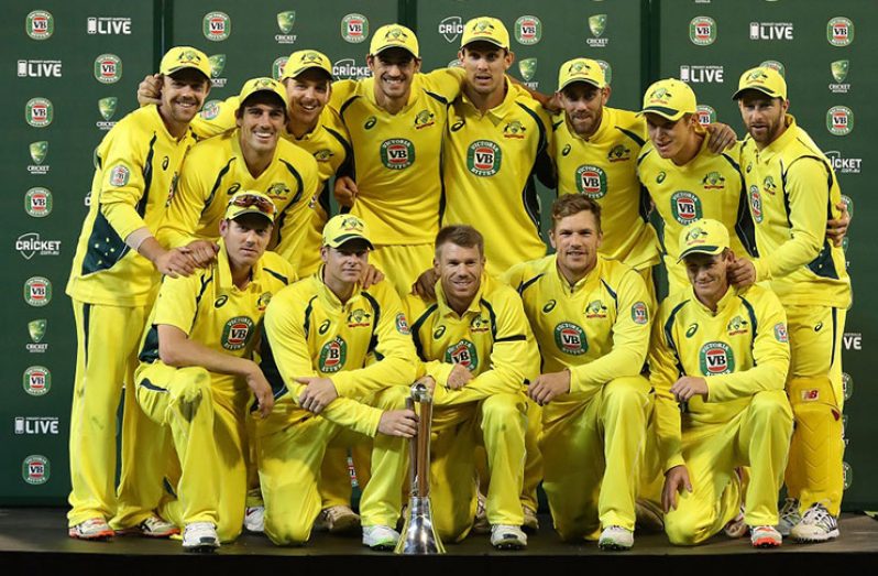 Australia pose with the Chappell-Hadlee trophy after sweeping the series 3-0 in the third and final ODI in Melbourne.