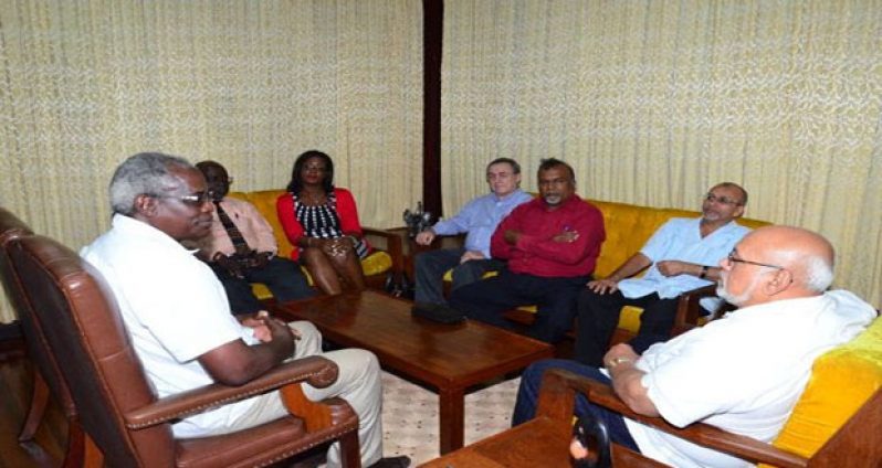 President Donald Ramotar in meeting with, from left, Public Works Minister Robeson Benn, Chairman of the GCAA Board Hugh Denbow, General Counsel of the GCAA Amanza Desir, Chief Executive Officer of CASSOS Captain Gregory Fox, Chairman of CASSOS and Director General of Trinidad and Tobago’s Civil Aviation Authority Ramesh Lutchmedial, and Director General of the GCAA Zulficar Mohamed