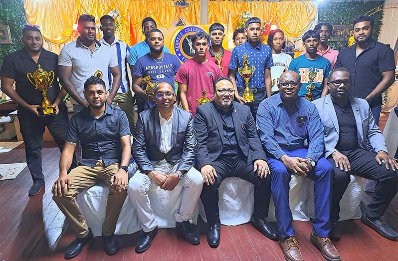 The awardees standing with their trophies while GCB’s President Singh is flanked by BCB’s officials (Sean Devers photo)