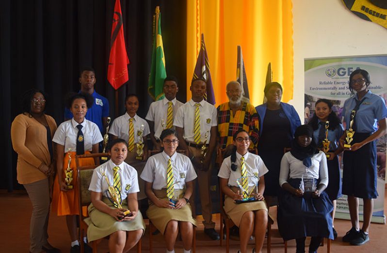 The awardees flanked by Head of GEA Energy Division, Shevon Wood; Administrator of Burrowes School of Art, Ivor Thom and acting ACEO Secondary, June-Ann Gonsalves