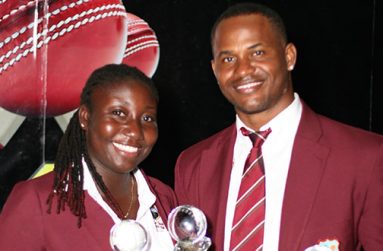Marlon Samuels (right) and Stafanie Taylor pose with their trophies after sweeping the top awards at the WICB/WIPA Awards Ceremony Tuesday night.