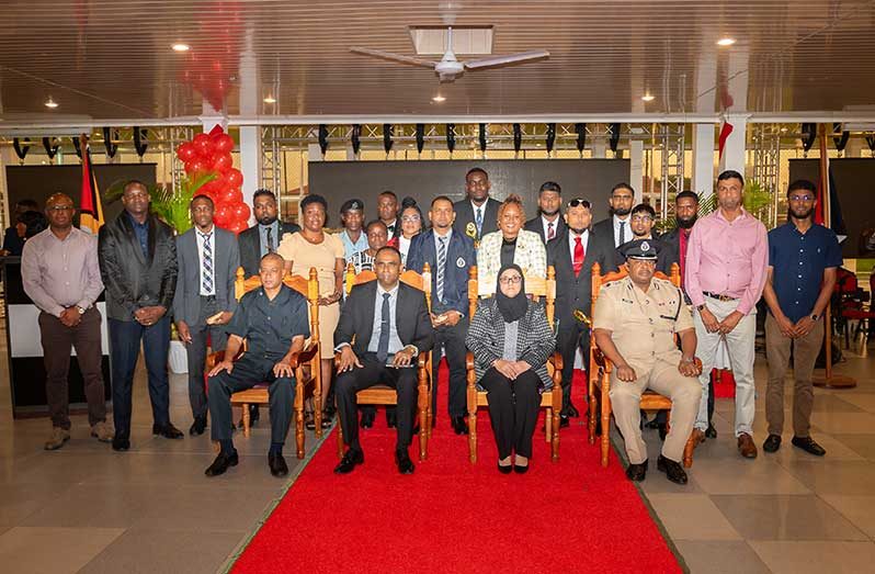 Seated from left: Head of the Special Organised Crime Unit, Deputy Commissioner Fazil Karimbaksh; Deputy Commissioner of ‘Law Enforcement’, Wendell Blanhum; Director of Public Prosecutions (DPP), Shalimar Ali-Hack and Deputy Commissioner, Simon McBean, with awardees and other officials (Delano Williams photo)