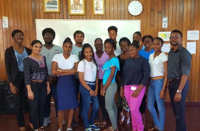 General Manager at the Masterclass Institute, Dennon Lewis (extreme right) poses with some of the young people who benefitted from the programme